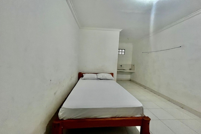 Imagen de la habitación del Hotel OYO Life 93504 Kost Krisna. Foto 6