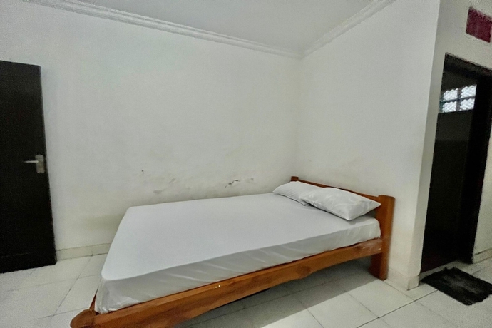 Imagen de la habitación del Hotel OYO Life 93504 Kost Krisna. Foto 7
