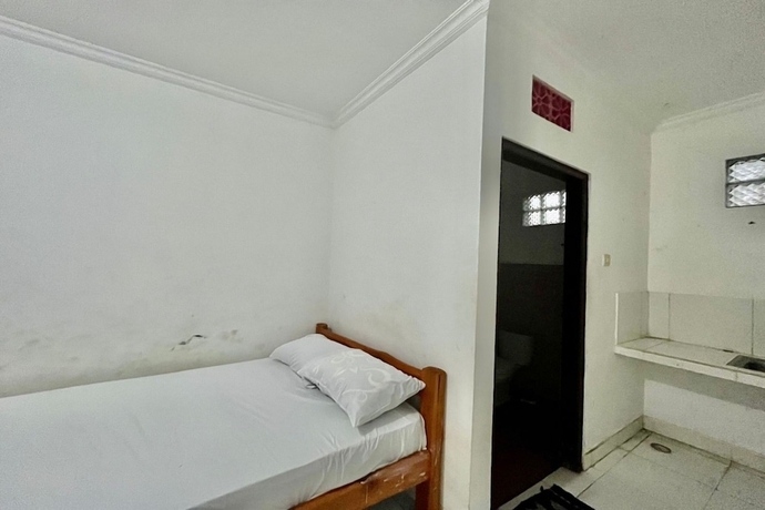 Imagen de la habitación del Hotel OYO Life 93504 Kost Krisna. Foto 9