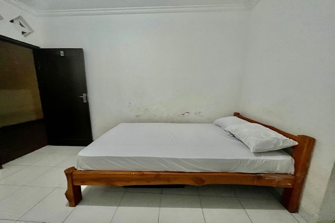 Imagen de la habitación del Hotel OYO Life 93504 Kost Krisna. Foto 11