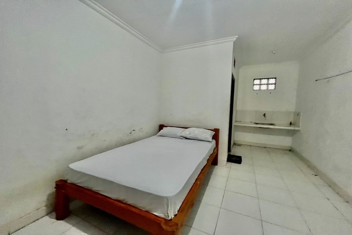 Imagen de la habitación del Hotel OYO Life 93504 Kost Krisna. Foto 12