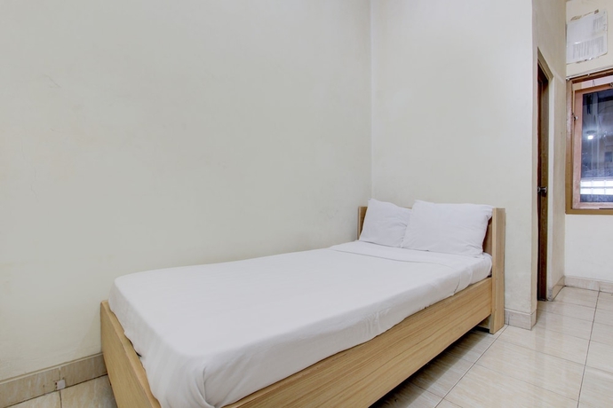 Imagen de la habitación del Hotel OYO Life 93662 Kost Pak Budi. Foto 3