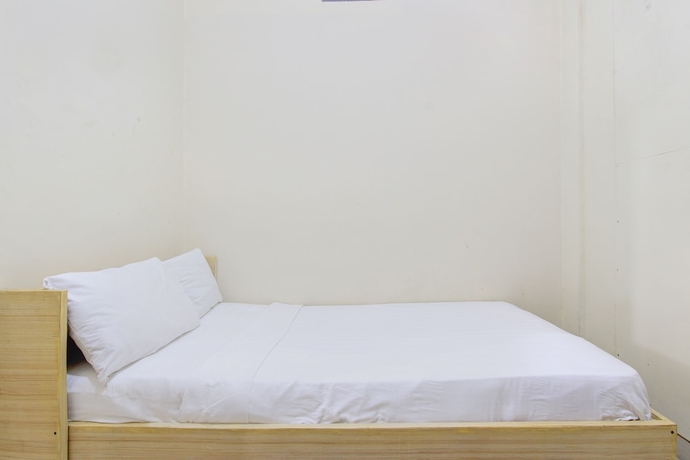 Imagen de la habitación del Hotel OYO Life 93662 Kost Pak Budi. Foto 4