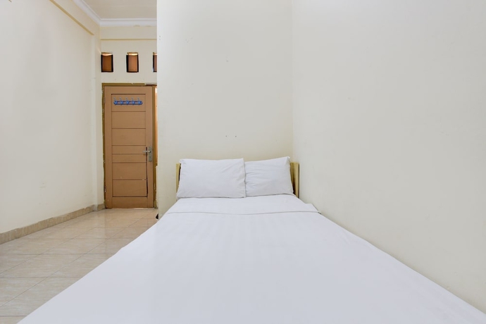 Imagen de la habitación del Hotel OYO Life 93662 Kost Pak Budi. Foto 5
