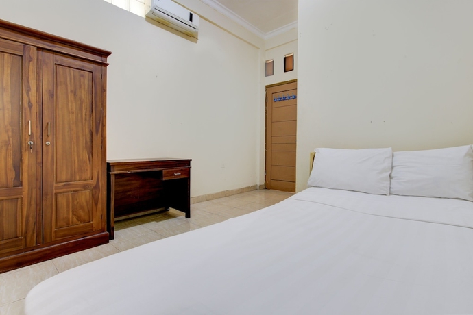 Imagen de la habitación del Hotel OYO Life 93662 Kost Pak Budi. Foto 7