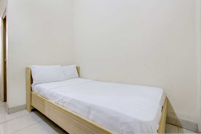 Imagen de la habitación del Hotel OYO Life 93662 Kost Pak Budi. Foto 8