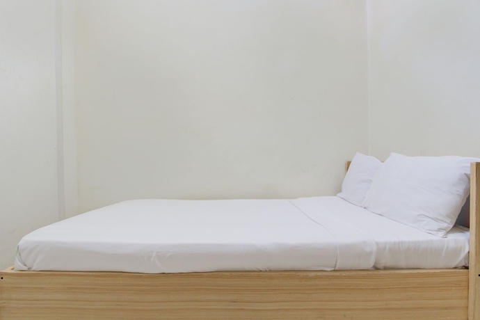 Imagen de la habitación del Hotel OYO Life 93662 Kost Pak Budi. Foto 9