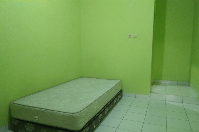Imagen de la habitación del Hotel OYO Life Kost ijo Tembok Tinggi. Foto 4