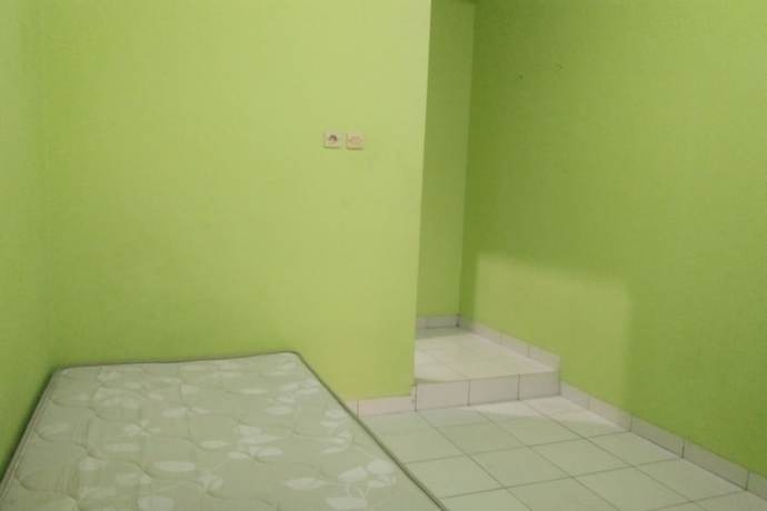 Imagen de la habitación del Hotel OYO Life Kost ijo Tembok Tinggi. Foto 7