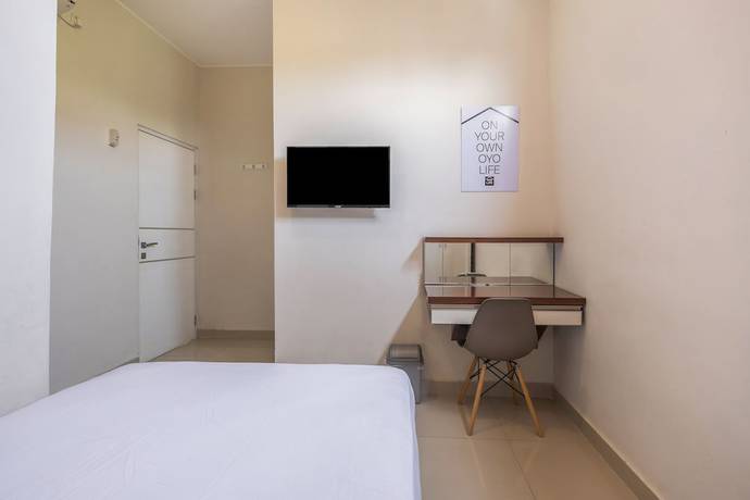 Imagen de la habitación del Hotel OYO Living 1877 Side Corner. Foto 9