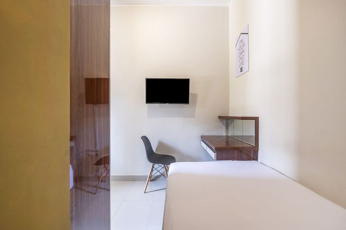 Imagen de la habitación del Hotel OYO Living 1877 Side Corner. Foto 12