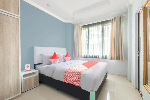 Imagen de la habitación del Hotel OYO Living 2195 Al Jazeerah Residence Syariah. Foto 19