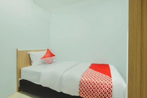 Imagen de la habitación del Hotel OYO Living 2195 Al Jazeerah Residence Syariah. Foto 20