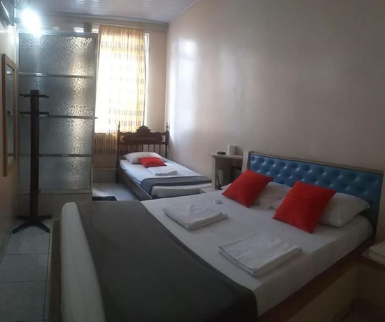 Imagen de la habitación del Hotel OYO Macedo. Foto 2