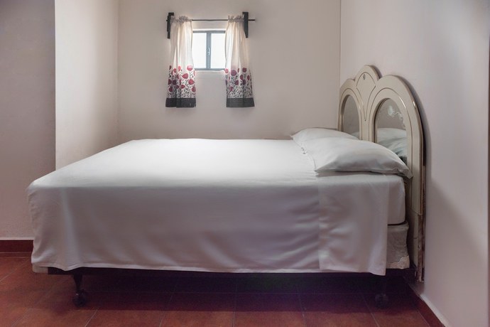 Imagen de la habitación del Hotel OYO Magueyaso. Foto 13