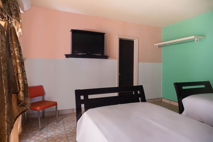 Imagen de la habitación del Hotel OYO Magueyaso. Foto 14