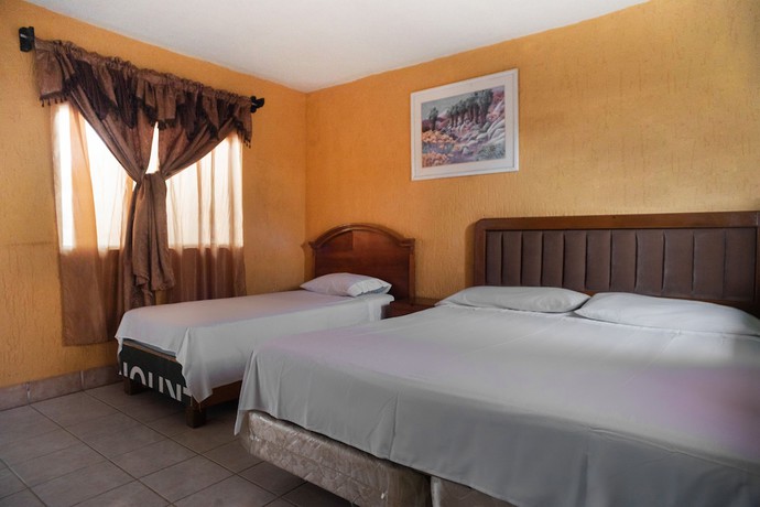 Imagen de la habitación del Hotel OYO Magueyaso. Foto 15