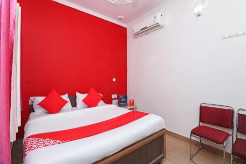 Imagen de la habitación del Hotel OYO Mahalaxmi Palace. Foto 20