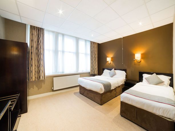 Imagen de la habitación del Hotel OYO Majestic. Foto 6