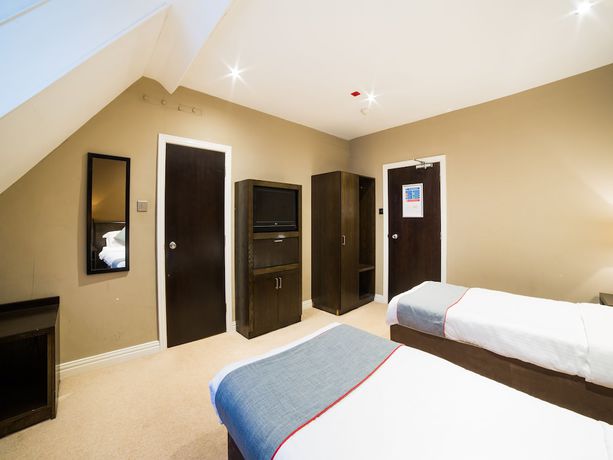 Imagen de la habitación del Hotel OYO Majestic. Foto 14