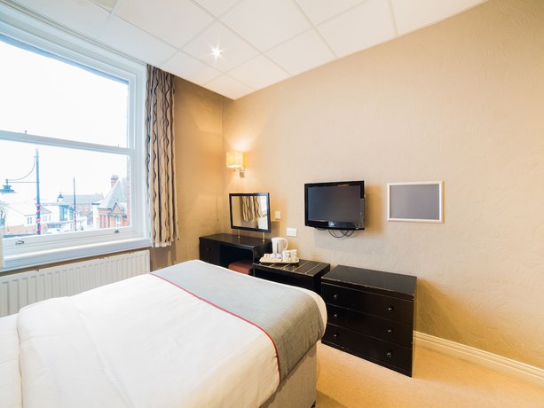 Imagen de la habitación del Hotel OYO Majestic. Foto 18