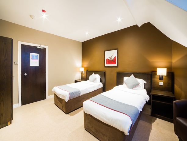 Imagen de la habitación del Hotel OYO Majestic. Foto 20