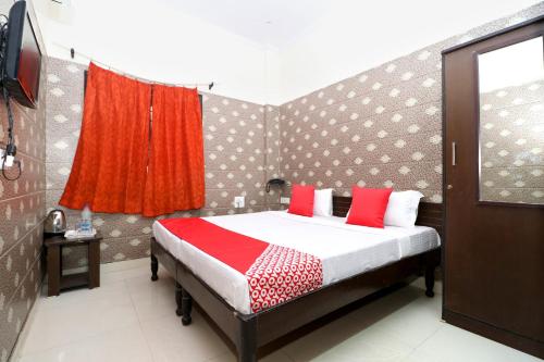 Imagen de la habitación del Hotel OYO Mall Residency. Foto 12