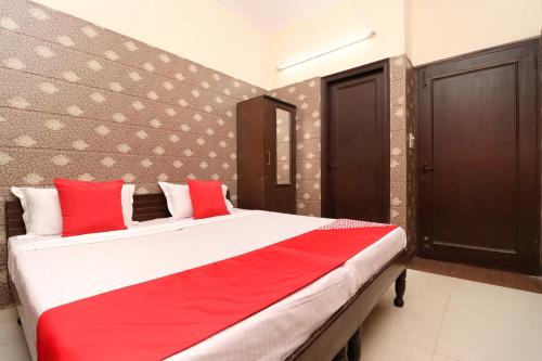 Imagen de la habitación del Hotel OYO Mall Residency. Foto 13