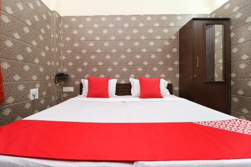 Imagen de la habitación del Hotel OYO Mall Residency. Foto 14