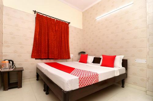 Imagen de la habitación del Hotel OYO Mall Residency. Foto 17