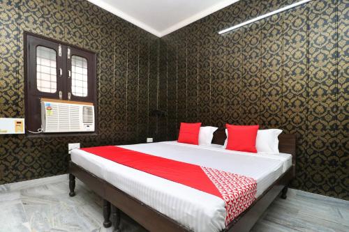 Imagen de la habitación del Hotel OYO Mall Residency. Foto 18