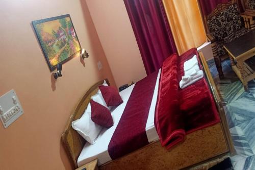 Imagen de la habitación del Hotel OYO Malti Guest House. Foto 5