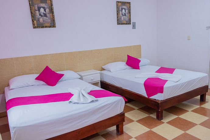 Imagen de la habitación del Hotel OYO Mar&iacute;as,Aeropuerto Internacional de Chetumal. Foto 9