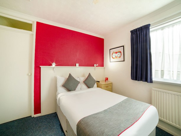 Imagen de la habitación del Hotel OYO Marina. Foto 14