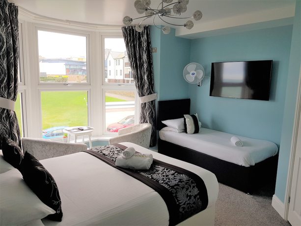 Imagen de la habitación del Hotel OYO Minerva Guesthouse. Foto 8