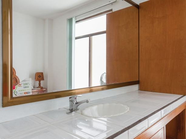 Imagen de la habitación del Hotel OYO Montes, Atlixco. Foto 11