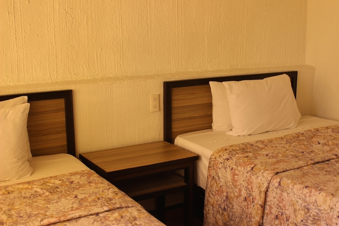 Imagen de la habitación del Hotel OYO Nueva Galicia. Foto 8