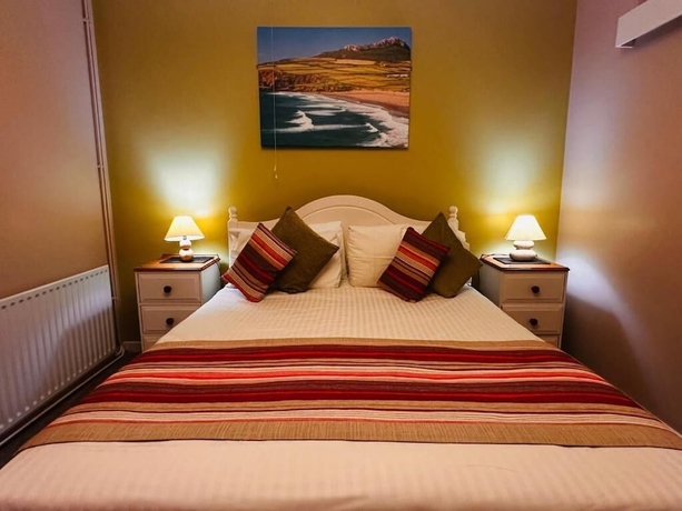 Imagen de la habitación del Hotel OYO Ocean Haze. Foto 2
