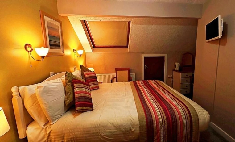 Imagen de la habitación del Hotel OYO Ocean Haze. Foto 3