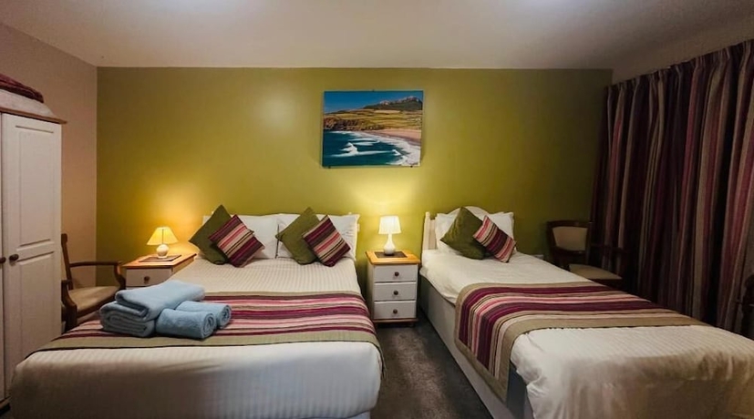 Imagen de la habitación del Hotel OYO Ocean Haze. Foto 4