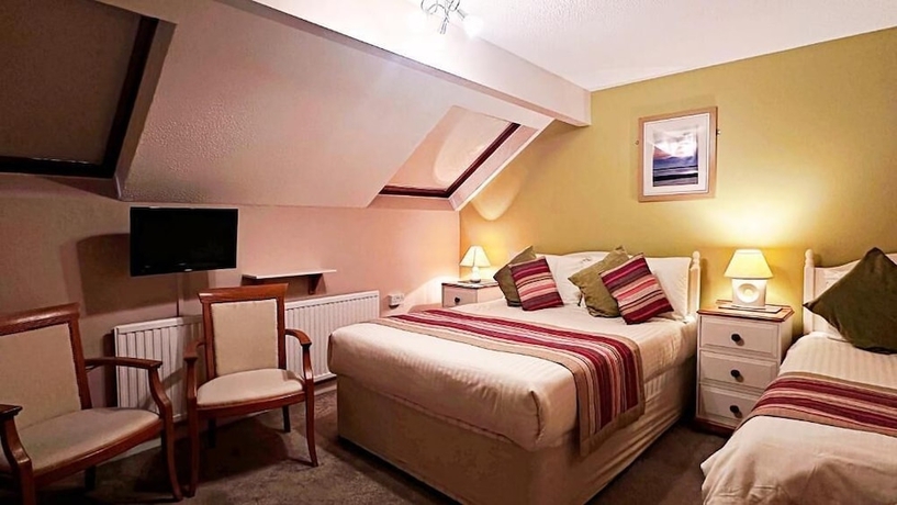 Imagen de la habitación del Hotel OYO Ocean Haze. Foto 6