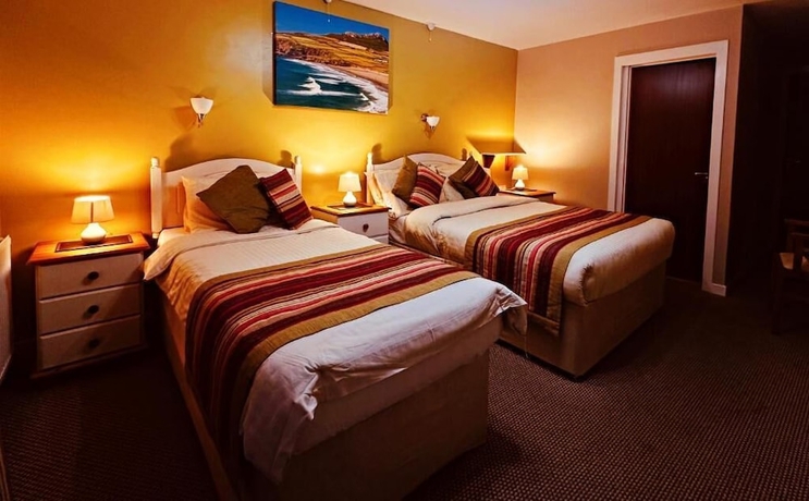 Imagen de la habitación del Hotel OYO Ocean Haze. Foto 9