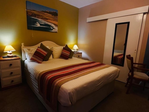 Imagen de la habitación del Hotel OYO Ocean Haze. Foto 11