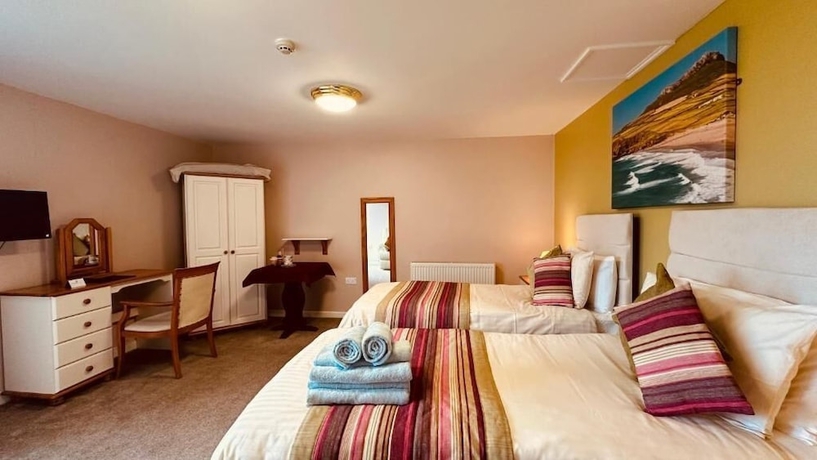Imagen de la habitación del Hotel OYO Ocean Haze. Foto 12