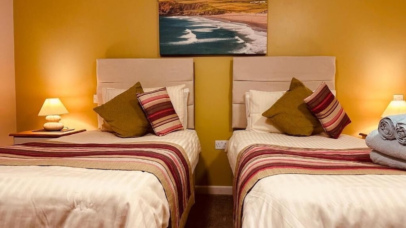 Imagen de la habitación del Hotel OYO Ocean Haze. Foto 14