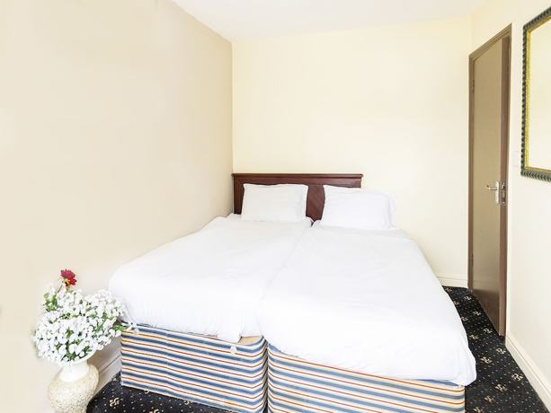 Imagen de la habitación del Hotel OYO Old Oak Tree Inn. Foto 6