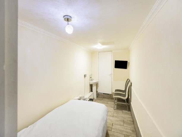 Imagen de la habitación del Hotel OYO Old Oak Tree Inn. Foto 18