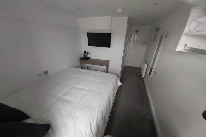 Imagen de la habitación del Hotel OYO Pier. Foto 13