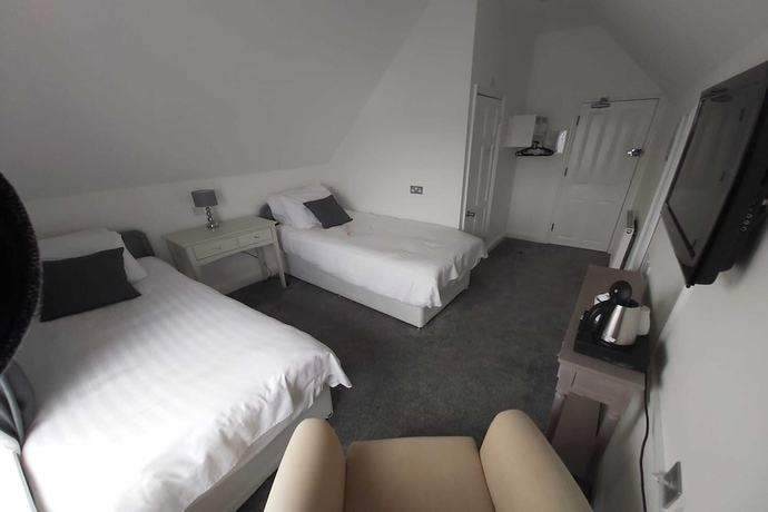 Imagen de la habitación del Hotel OYO Pier. Foto 16