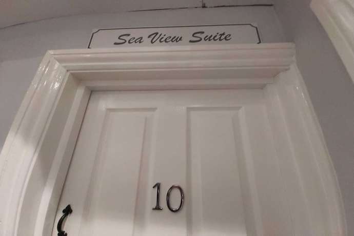 Imagen de la habitación del Hotel OYO Pier. Foto 17